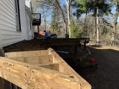 Close view of damaged old deck beam removed during Chanhassen deck replacement