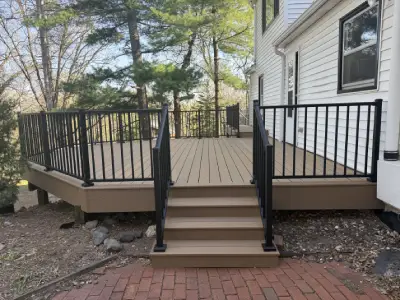 New composite deck stairs leading up to a Chanhassen deck replacement