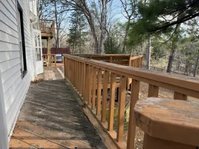 Aging wood deck and railings on a Chanhassen deck replacement project