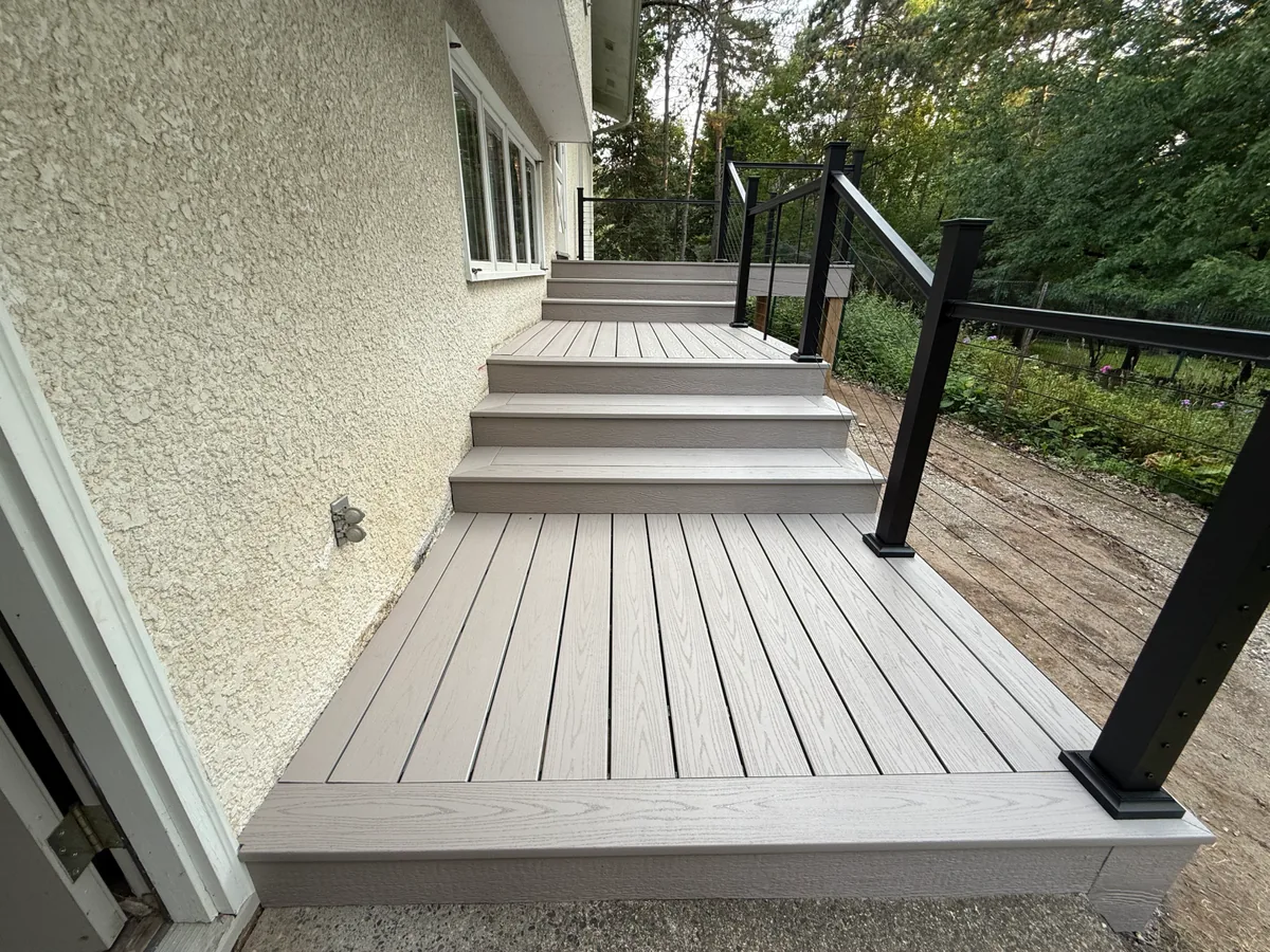 Lower deck level and wide composite stairs on Cottage Grove deck project