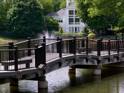 Hopkins community bridge redecking project with new decking and railings by Brewer Built