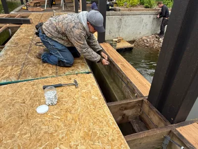 Electrical wiring work coordinated during a Hopkins bridge redecking project