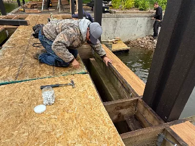 Wiring and bridge deck preparation during a community redecking project