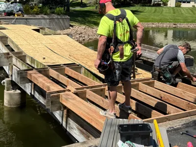New posts installed during a Hopkins community bridge redecking project