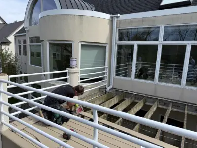 Danny and Eli working on the Hopkins deck after old boards were removed