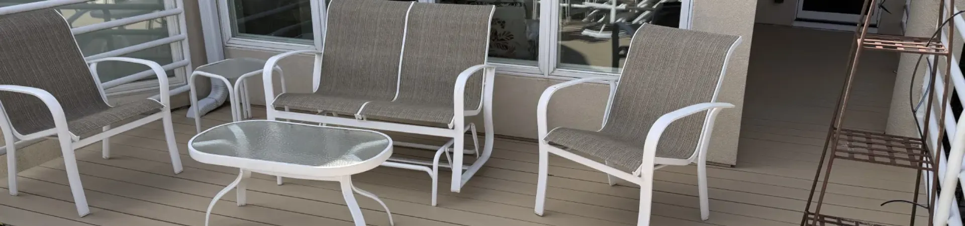 Completed Hopkins deck resurfacing project with composite decking and white railings