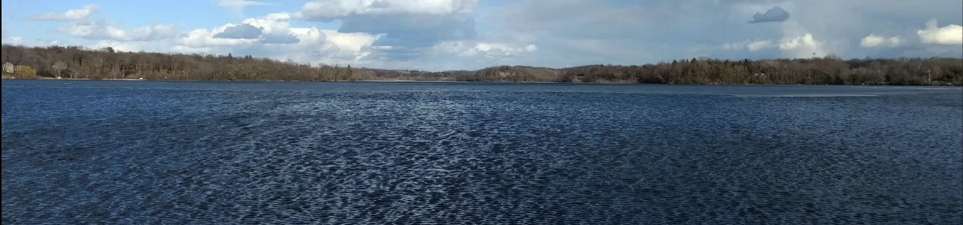 Custom deck and outdoor living project by Brewer Built in Long Lake, Minnesota