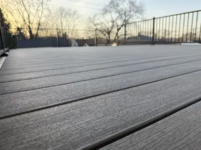 Dimitrii Mamoikin standing near the completed Minneapolis garage deck project