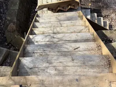 Old landing and lower stair area after demolition on a Minnetonka deck project