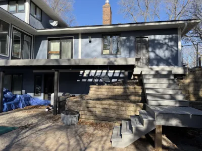 Composite decking installed on rebuilt stairs and landing in Minnetonka