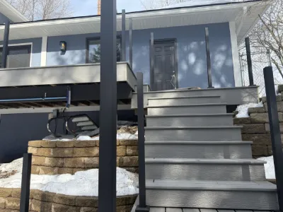 View up the newly rebuilt composite stairs leading to the deck in Minnetonka