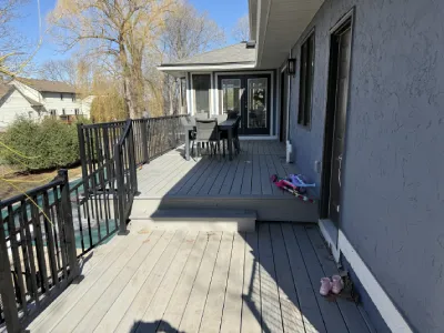 Finished deck surface and railing system on the elevated Minnetonka deck