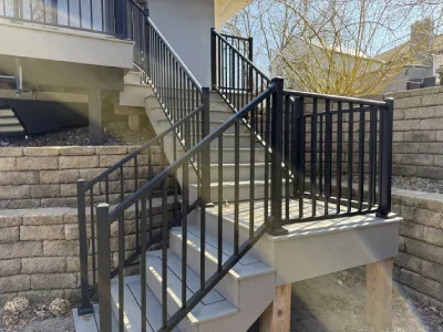 Finished stair railings and lower landing on the Minnetonka deck project