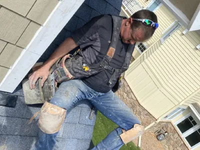 Close-up of exterior roof and trim work during a Minnetonka house construction project