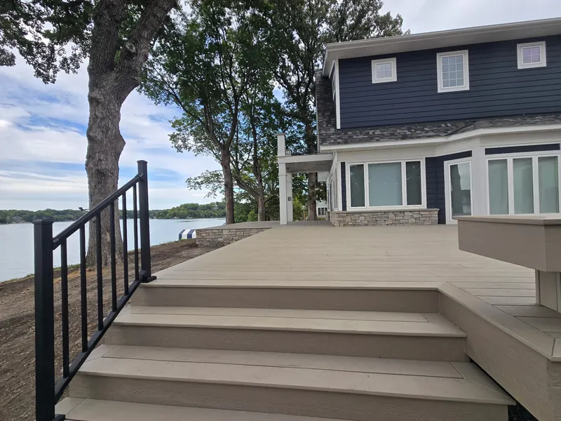 Minnetrista composite deck with broad stairs and lake views