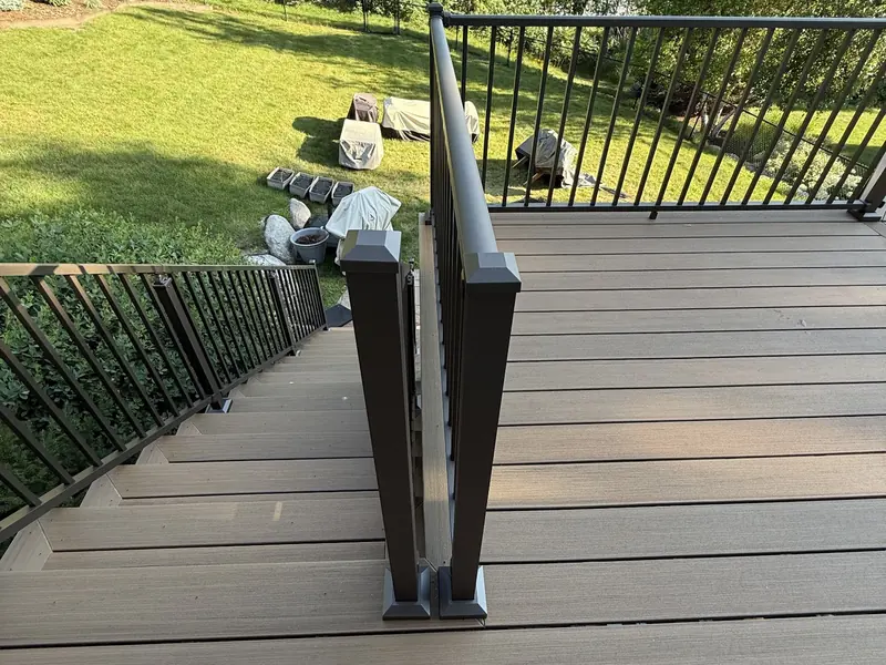 Savage upper composite deck and staircase overlooking the backyard