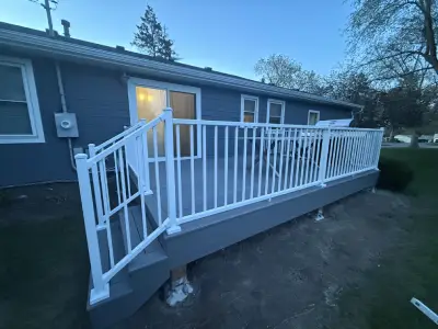 Finished stair and railing section on a Wayzata composite deck project