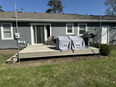 Wide before view of the Wayzata deck before resurfacing and railing installation