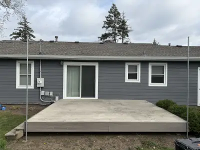 Front view of the old deck surface before new composite decking was installed