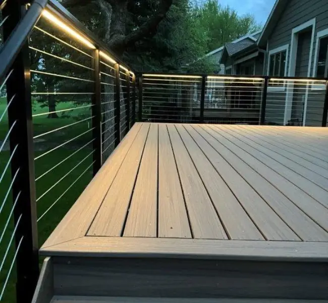 Black aluminum deck railing installed by Brewer Built