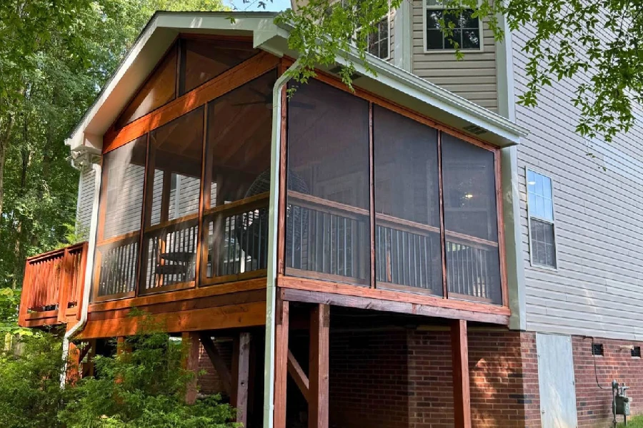 Screen room addition built on an elevated rear deck