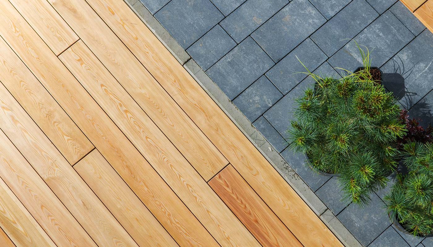 wood deck and concrete bricks pavement in a garden 2021 08 29 16 57 17 utc
